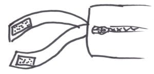 A drawing of velcro cushion ties in the centre of the thickness at the rear of the cushion. The velcro straps are long enough and sewn in a way to wrap around one leg of a chair.